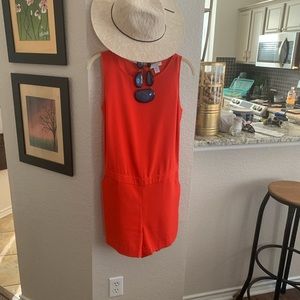 Chic orange romper.